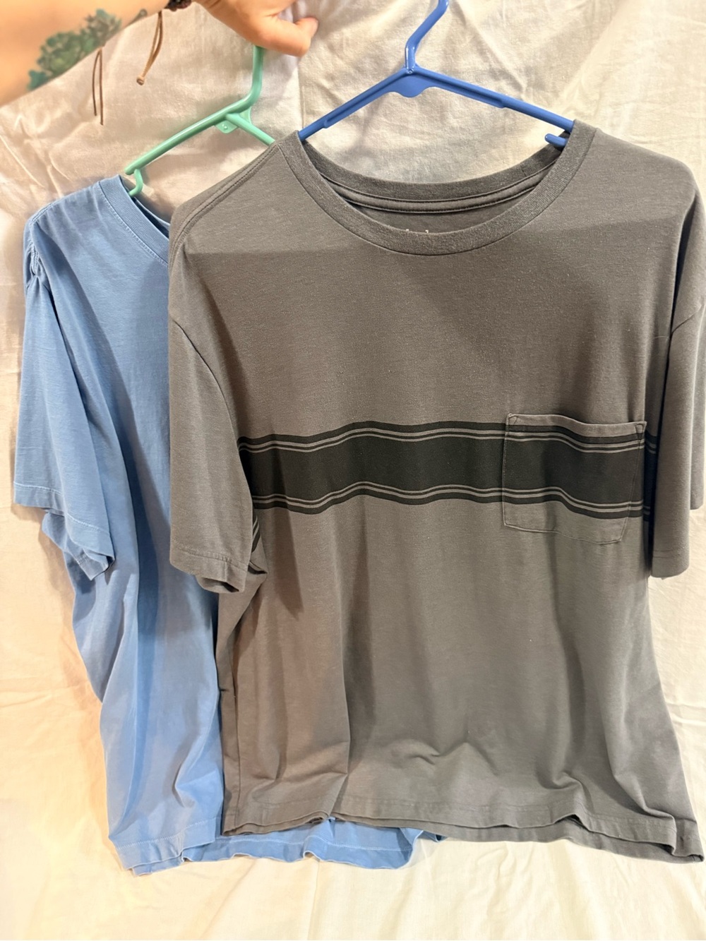 Two men’s t-shirts